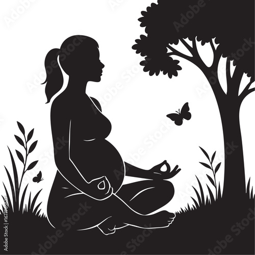 Pregnant woman meditating in nature
