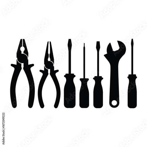 Collection of silhouetted hand tools including pliers screwdrivers and a wrench