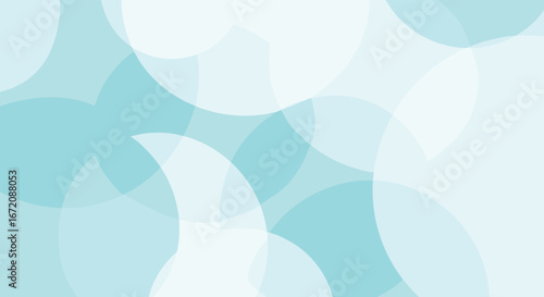 Modern abstract background with overlapping translucent circles in soothing shades of blue