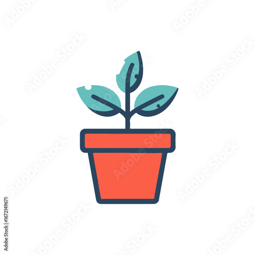 A vibrant potted plant with green leaves growing, symbolizing growth and freshness indoors