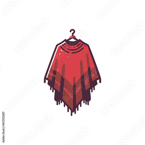 Colorful draped poncho hanging on a hook, showcasing artistic patterns against a plain background
