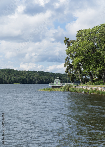 Wallpaper Mural view of a lake and forest on a cloudy day in Sweden Torontodigital.ca