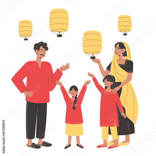 Happy Indian family celebrating Diwali by releasing paper lanterns