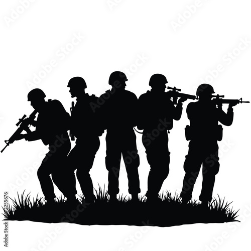 Five soldiers in silhouette aiming rifles on grassy ground