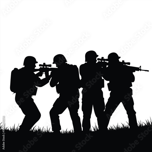 Four soldiers in silhouette aiming rifles in grass