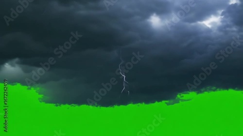 Thunderstorm, lightning, dark clouds, rain on a green screen.