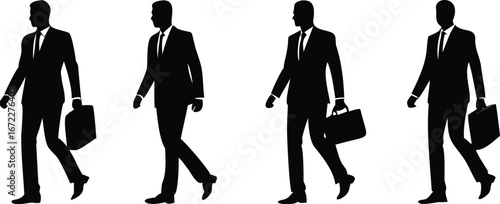 silhouette of a businessman walking with briefcase