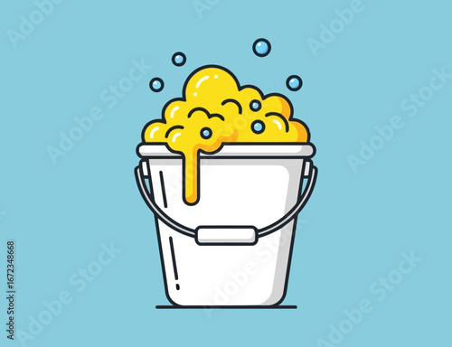 White bucket filled with yellow soapy water and foam