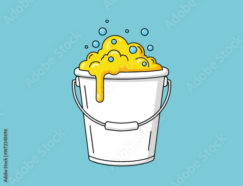 White bucket filled with yellow soapy water and foam
