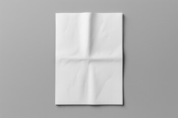 Folded newspaper mockup on gray background