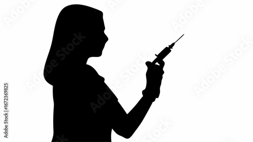Silhouette of a woman holding a syringe with a needle in her hand ready for an injection shot pose