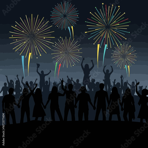 Silhouetted crowd watches colorful fireworks explode in a dark night sky.