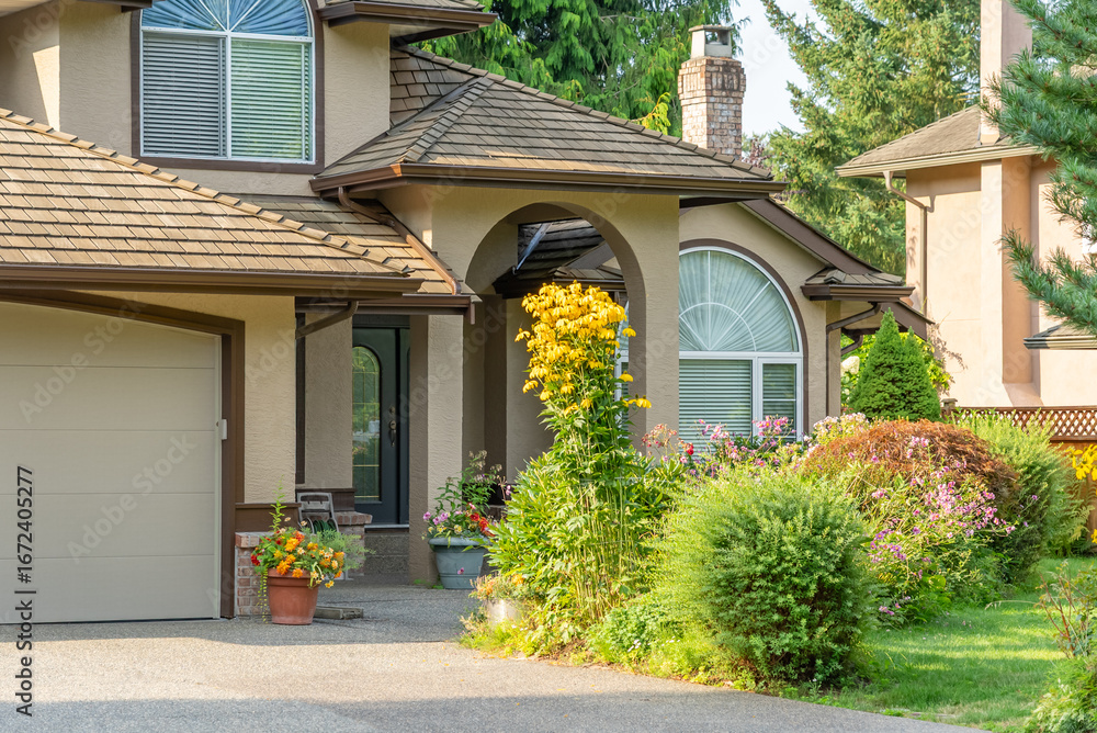 Obraz premium Entrance of luxury house in summer with nice landscape in Vancouver, Canada, North America. Day time on August 2025.