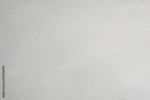 A soft, outoffocus background with a gentle gradient of light gray, offering a subtle texture and ample negative space for creative use