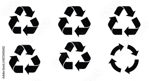 Black recycling symbols on a white background silhouette