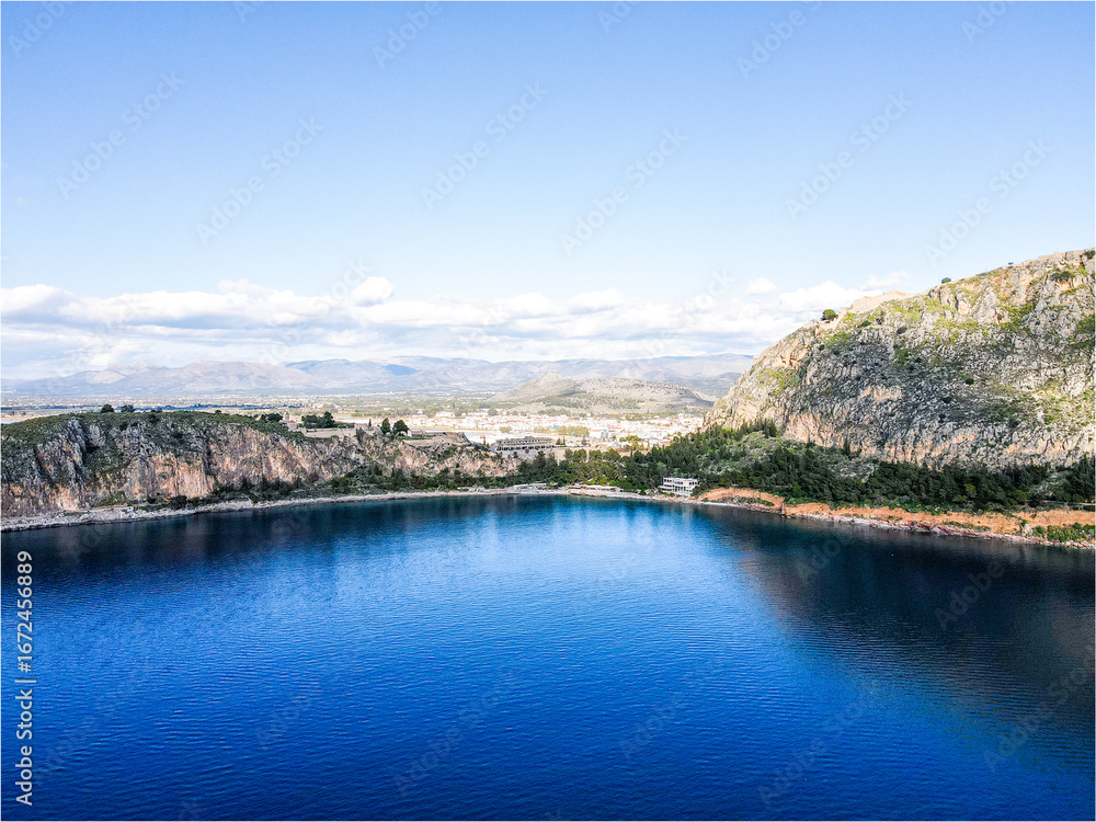 Fototapeta premium Aerial Mediterranean Sea beach and cliffs nature landscape winter sunny day in Nafplio Greece