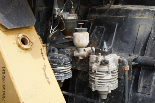 Detail on heavy equipment. We can see the engines.