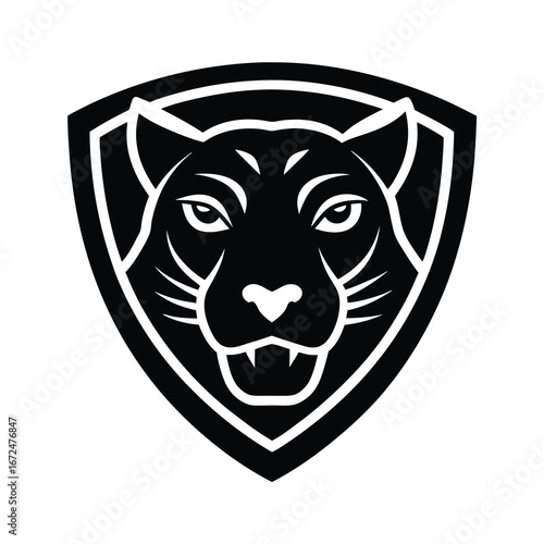 silhouette of a jaguar face with spotted pattern