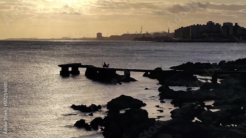 Wide shot montevideo coastal and skyline at background high contrast sunset landscape video
