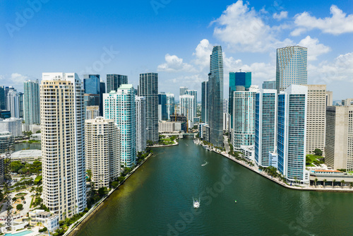 Aerial view of Brickell skyscrapers. Modern cityscape of downtown Miami. Panoramic Miamis skyline above the coastline. Brickell Key aerial view in Miami. Landscape of Miami. Miami Beach and Brickell.