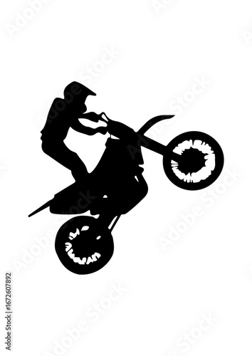 Motocross Rider Performing a Wheelie