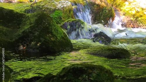 A 20-second still video of the Aude River in the Axat Valley. Water flows among rocks with small waterfalls in the forests of southern France.