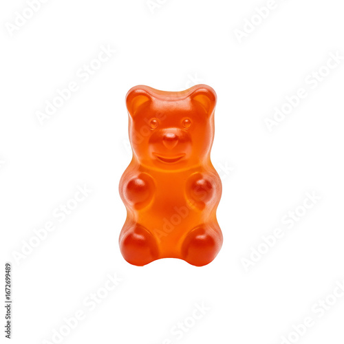 Orange gummy bear stands centered against a dark with soft studio lighting. - high quality Orange gummy bear stands centered against a dark with soft