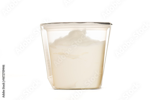 A small plain yogurt container