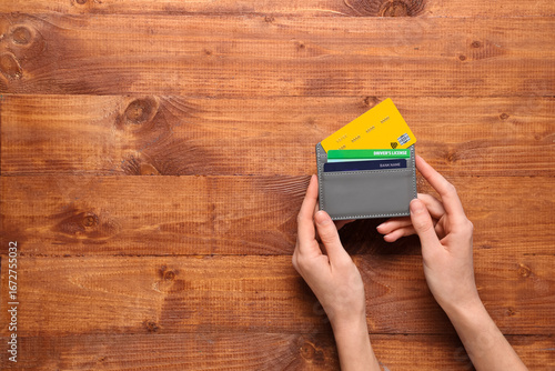 Female hands with grey cred...