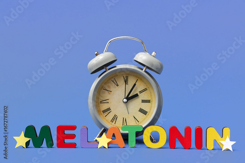 Alarm clock with paper star...