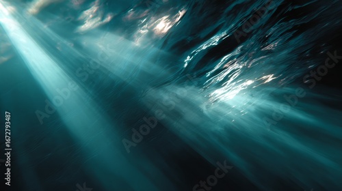 Abstract underwater scene with fragmented light beams in turquoise water, evoking a sense of fluid motion.
