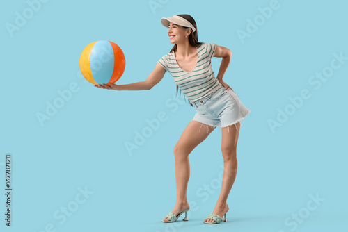 Young woman in summer cap w...