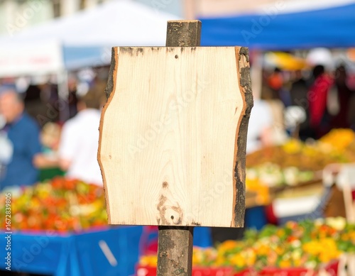 Blank Wooden Sign at a Vibrant Farmers Market.