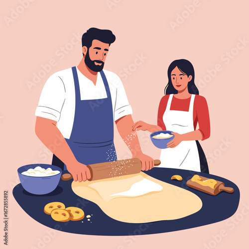 A bearded man and a woman in aprons baking together rolling out dough on a table.