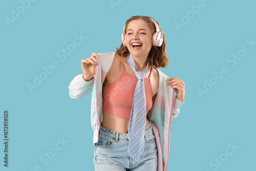 Cool young woman listening ...