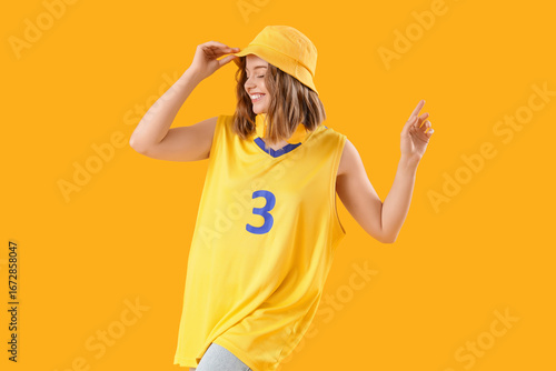Cool young woman dancing on...