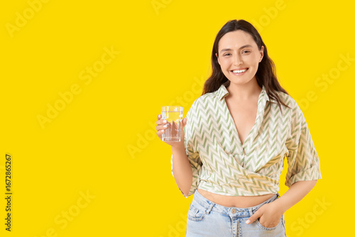 Young woman with glass of w...