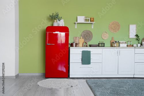 Retro red refrigerator in m...