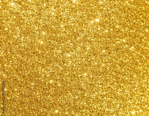 金色に輝くキラキラしたラメのグリッターテクスチャ背景素材