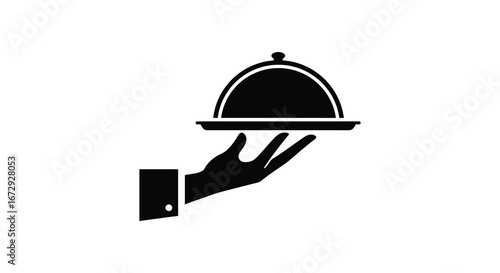 A hand holding a covered serving dish with a dome lid