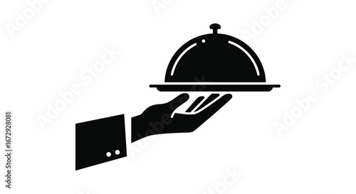 A hand holding a covered serving dish with a dome lid