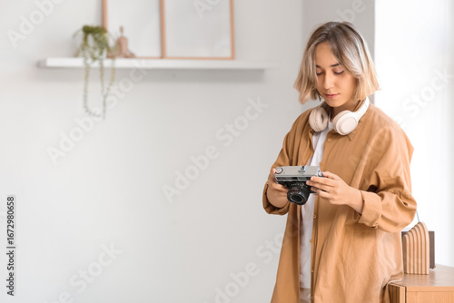 Beautiful woman with photo ...