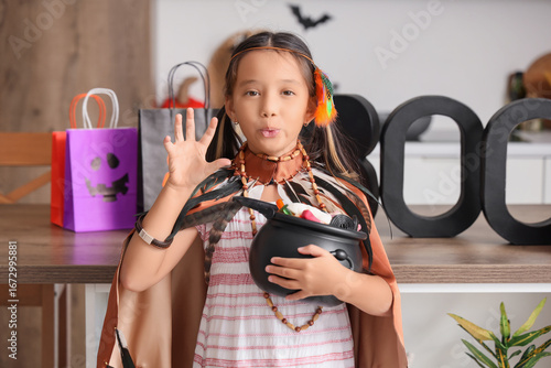 Cute Asian girl dressed for...