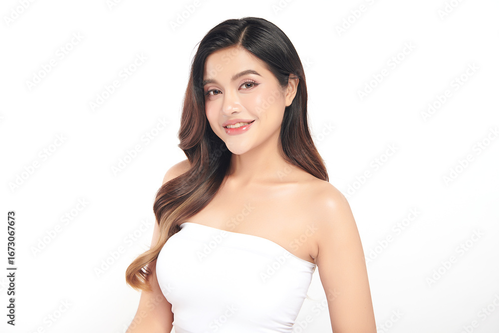 A beautiful young Asian woman with clean, fresh skin against a white background. Skincare, facial treatment, cosmetology, beauty, and spa. An elegant portrait of an Asian woman. A beautiful young Asian woman with clean, fresh skin against a white background. Skincare, facial treatment, cosmetology, beauty, and spa. An elegant portrait of an Asian woman.
