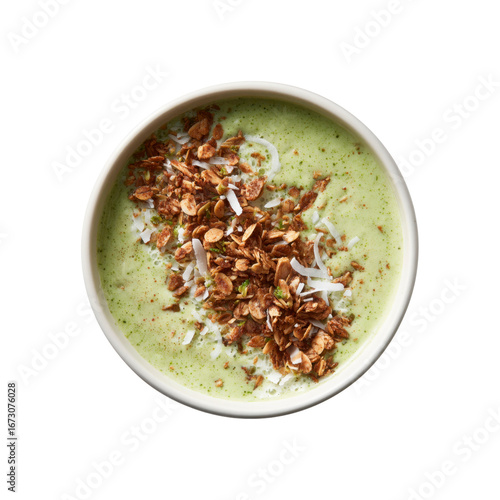 Delicious Green Smoothie Bowl with Granola and Coconut Flakes