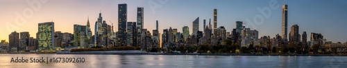 Panorama of the skyline of Midtown Manhattan with the Chrysler Building after sunset
