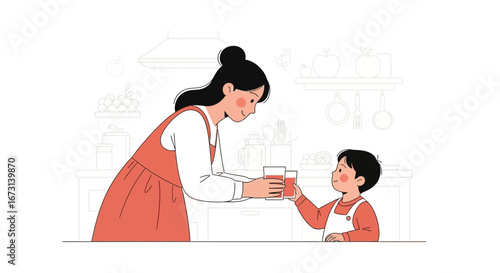 Mother And Son Toasting With Juice Glasses In A Kitchen While Smiling Gleefully