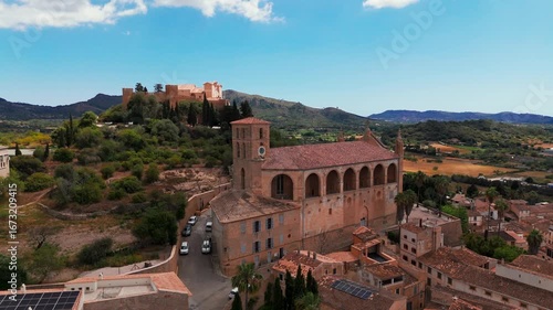Aerial Drone Shot Circling Low Over Santuari de Sant Salvador And Rural Town Of Arta, Mallorca, Spain.