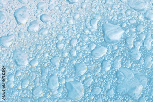 Close-up of light blue water droplets