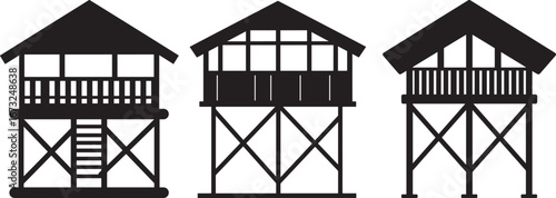 Three traditional stilt houses with distinct architectural details silhouette
